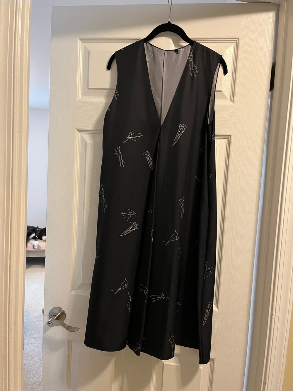 Sleeveless Black silk V-Neck Midi Dress with Subtle Line Motif